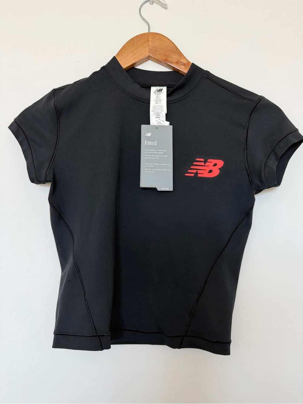 New Balance Black Short Sleeve Fitted Tee with Red Logo
